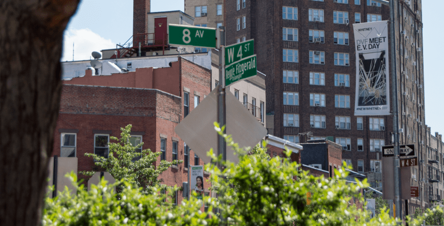 Street signs at 8th Avenue and West 4th